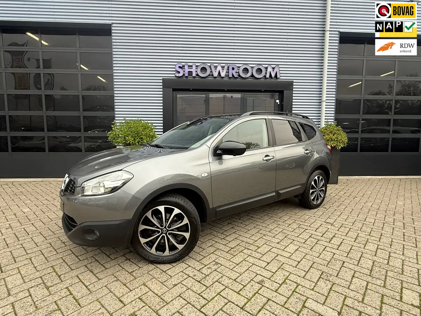 Nissan Qashqai+2 1.6 |7Persoons| Pano|360 Camera|Navi|18Inch velgen Grijs - 1