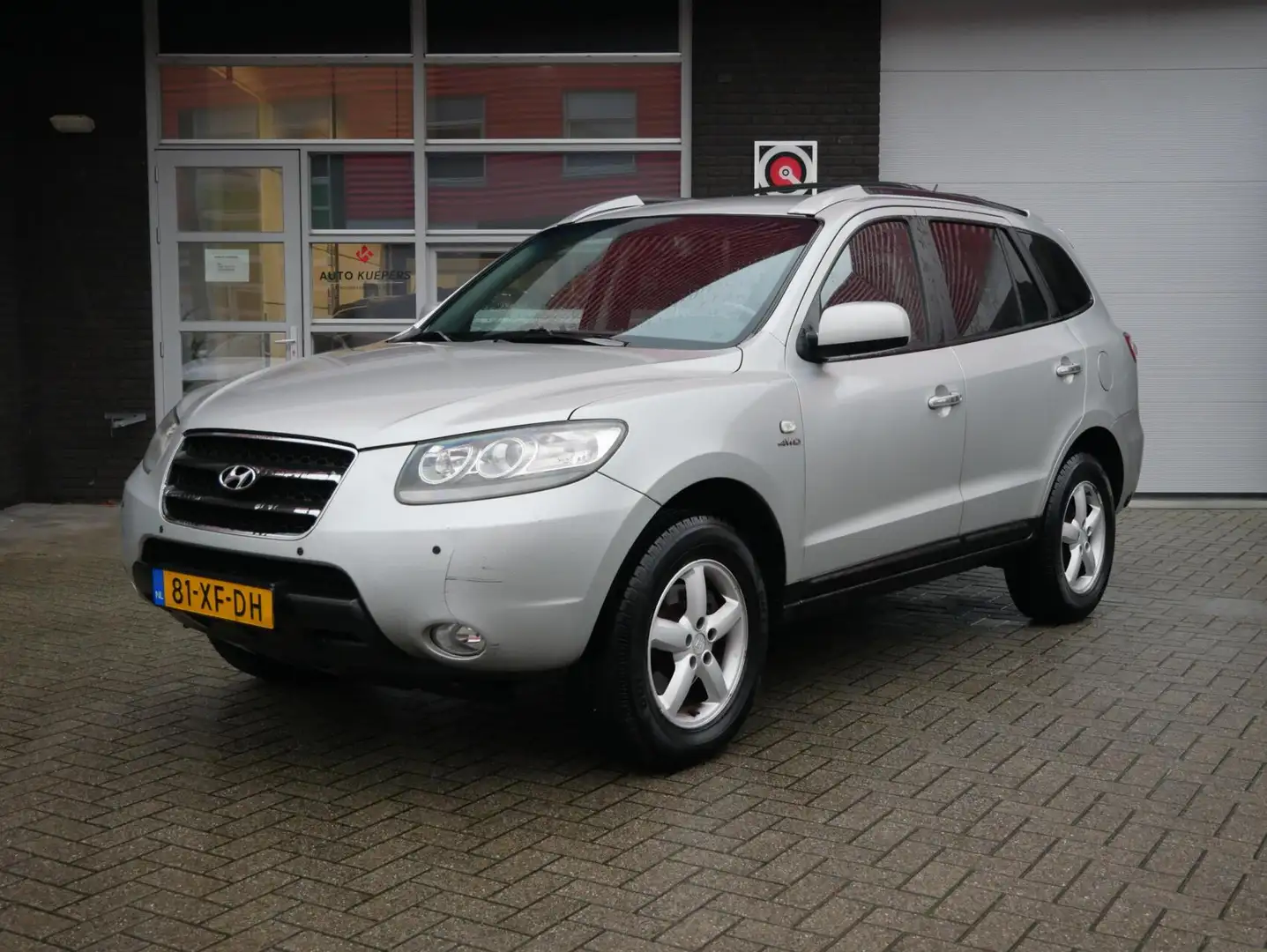 Hyundai SANTA FE 2.7i V6 4WD Style Premium 7p. NL AUTO| 2e EIGENAAR Gris - 1