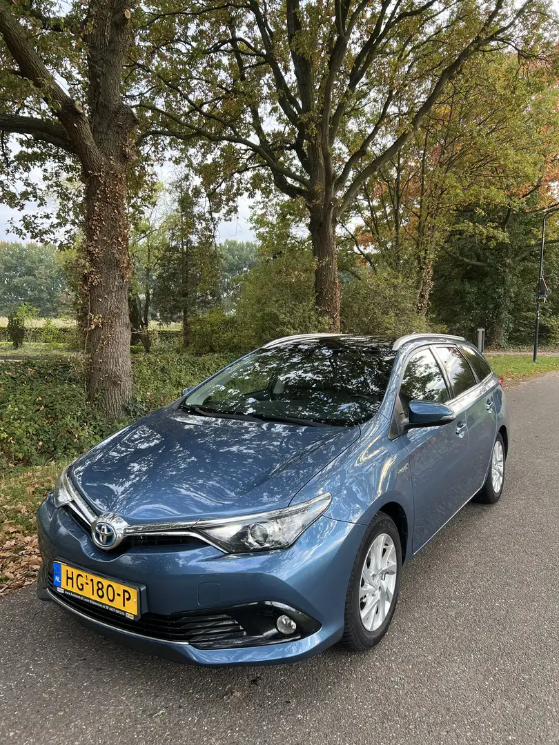 Toyota Auris 1.8 Hybrid Lease Pro Blauw - 1