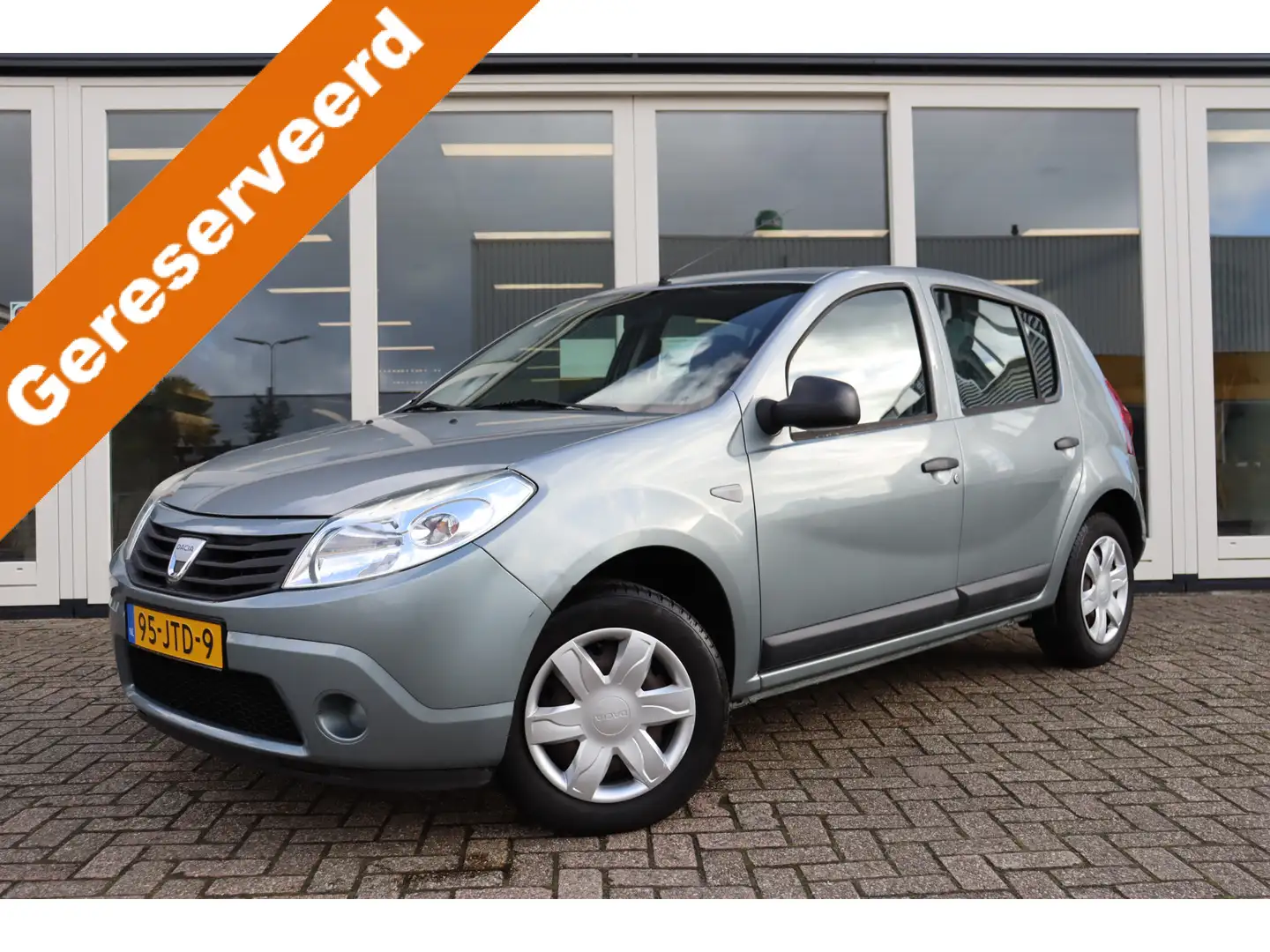 Dacia Sandero 1.2 Ambiance, Airco, Prijs Is Rijklaar Gris - 1