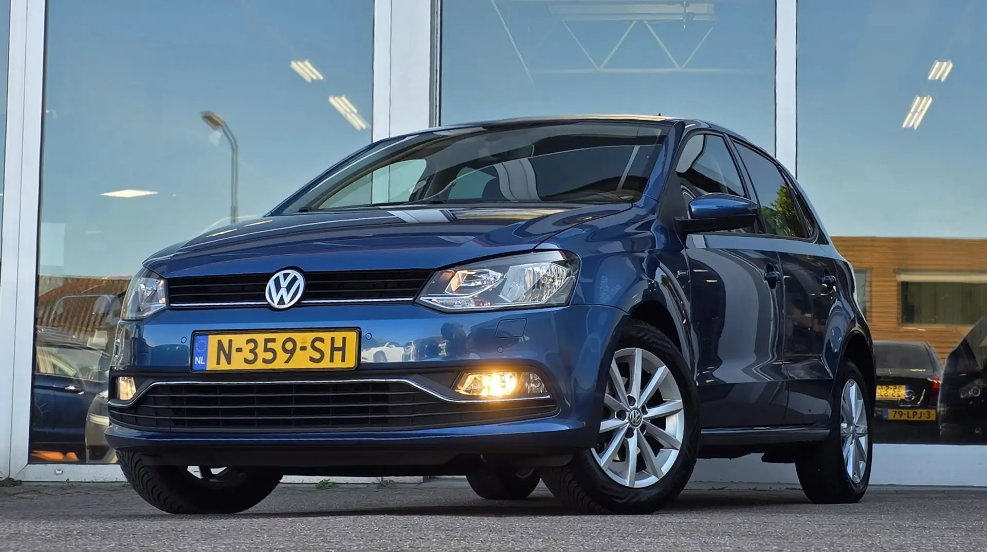 Volkswagen Polo 1.0 Comfortline Clima Stoelverwarming Nieuwe APK M Bleu - 1