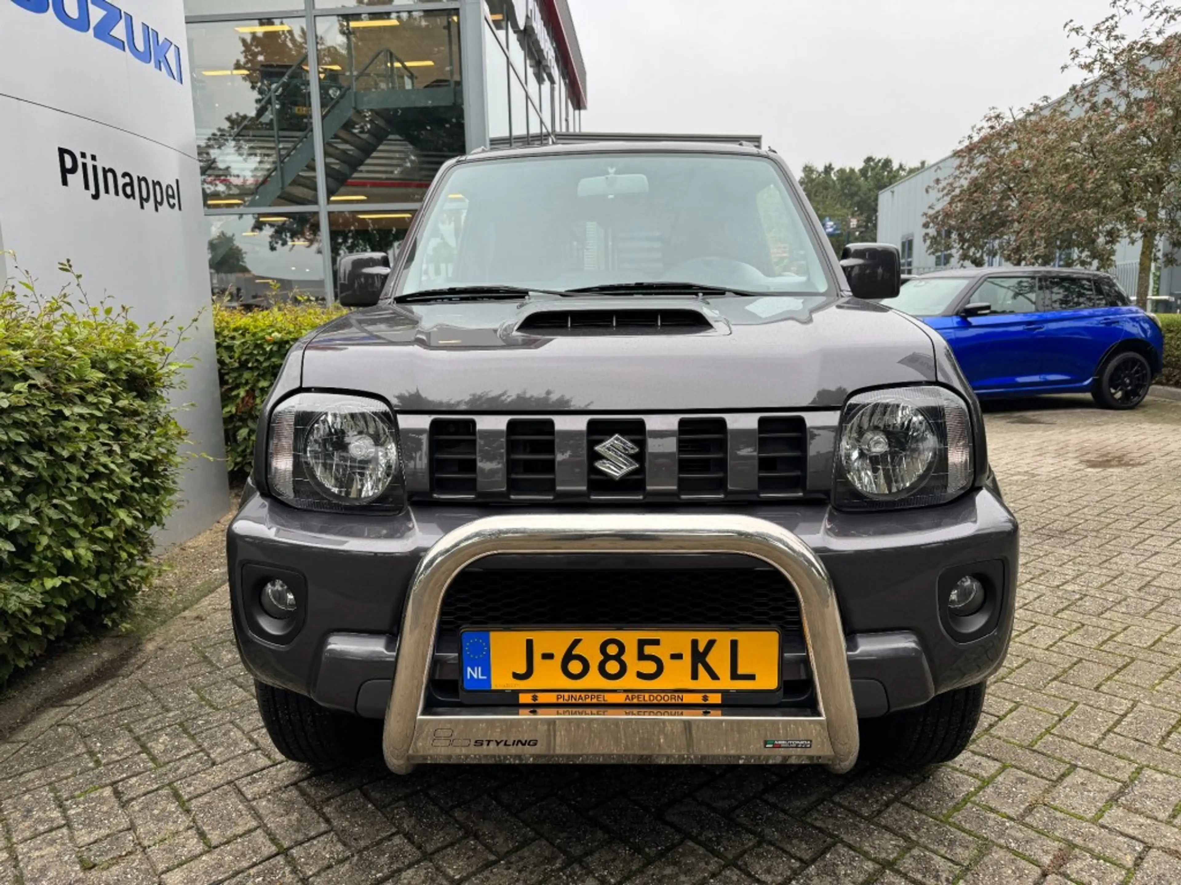 Suzuki Jimny 1.3 Exclusive Metal Top 4x4 Airco/Leder/Trekhaak — photo 4