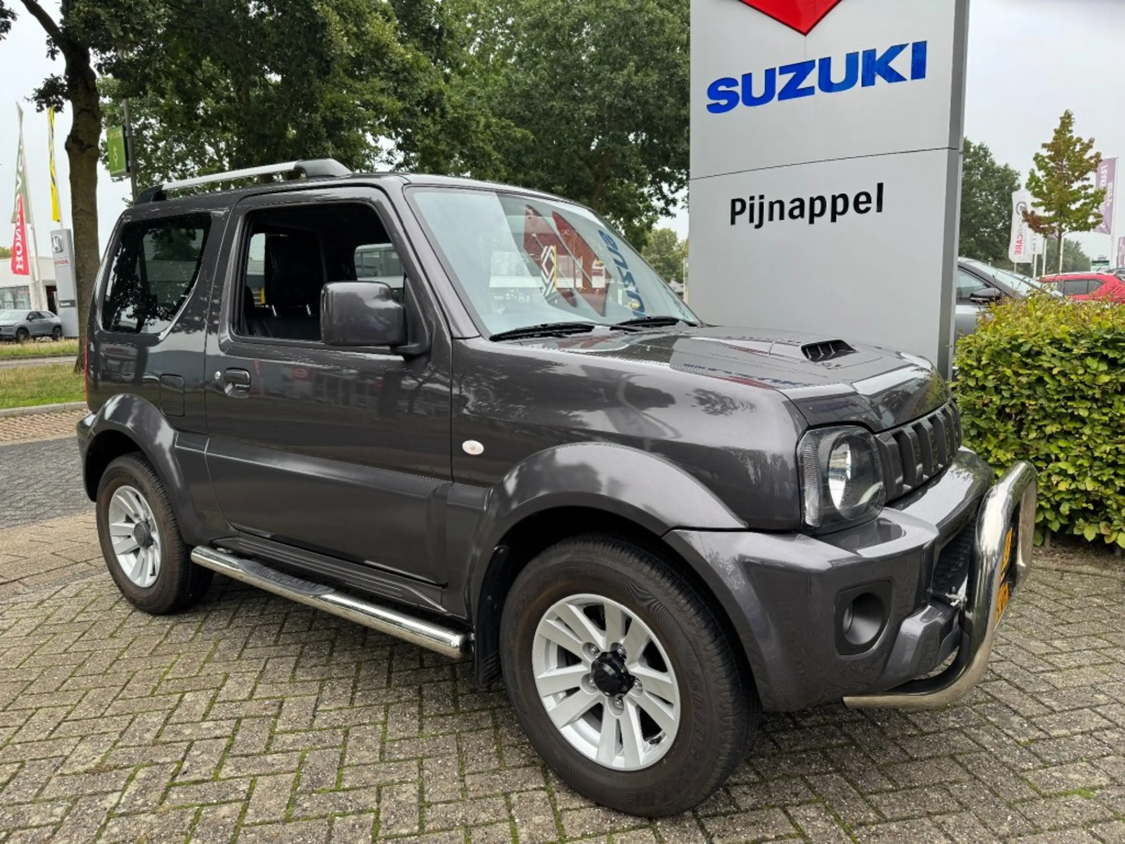 Suzuki Jimny 1.3 Exclusive Metal Top 4x4 Airco/Leder/Trekhaak — photo 10
