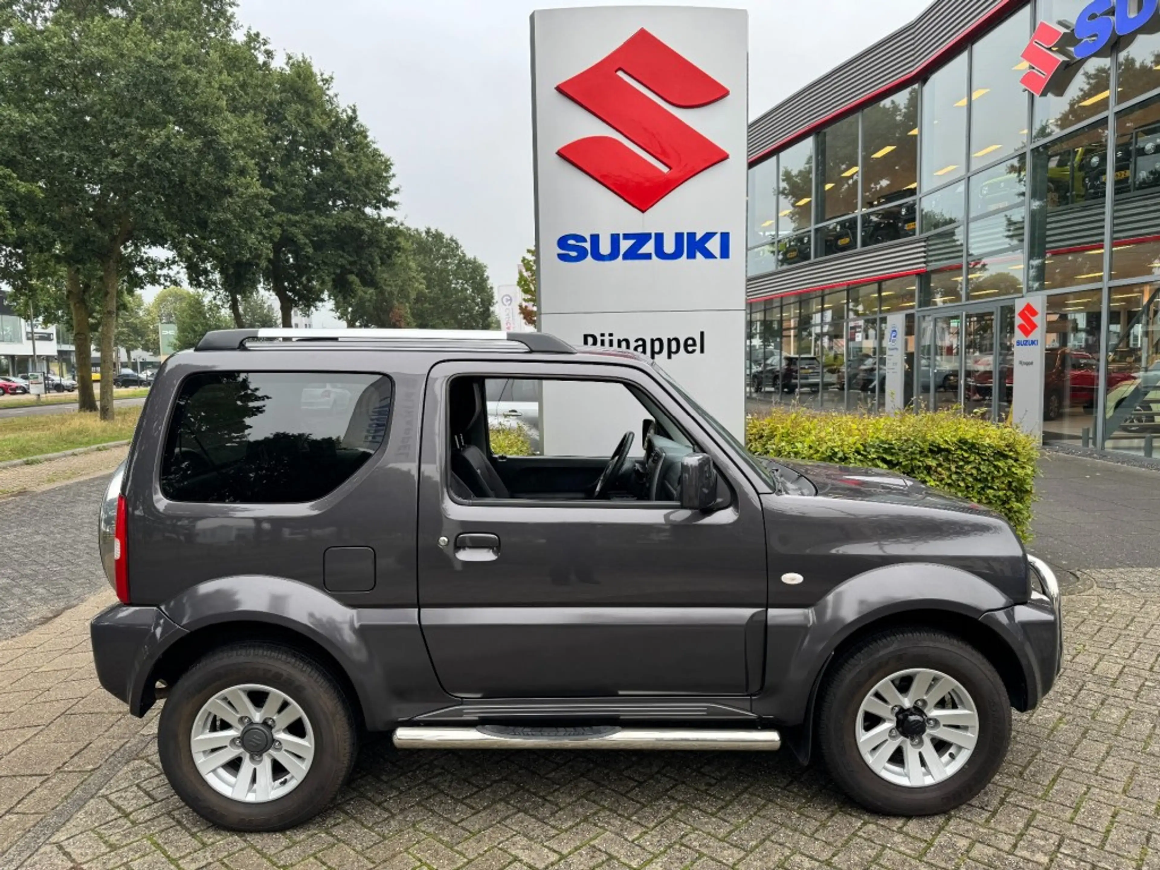 Suzuki Jimny 1.3 Exclusive Metal Top 4x4 Airco/Leder/Trekhaak — photo 9