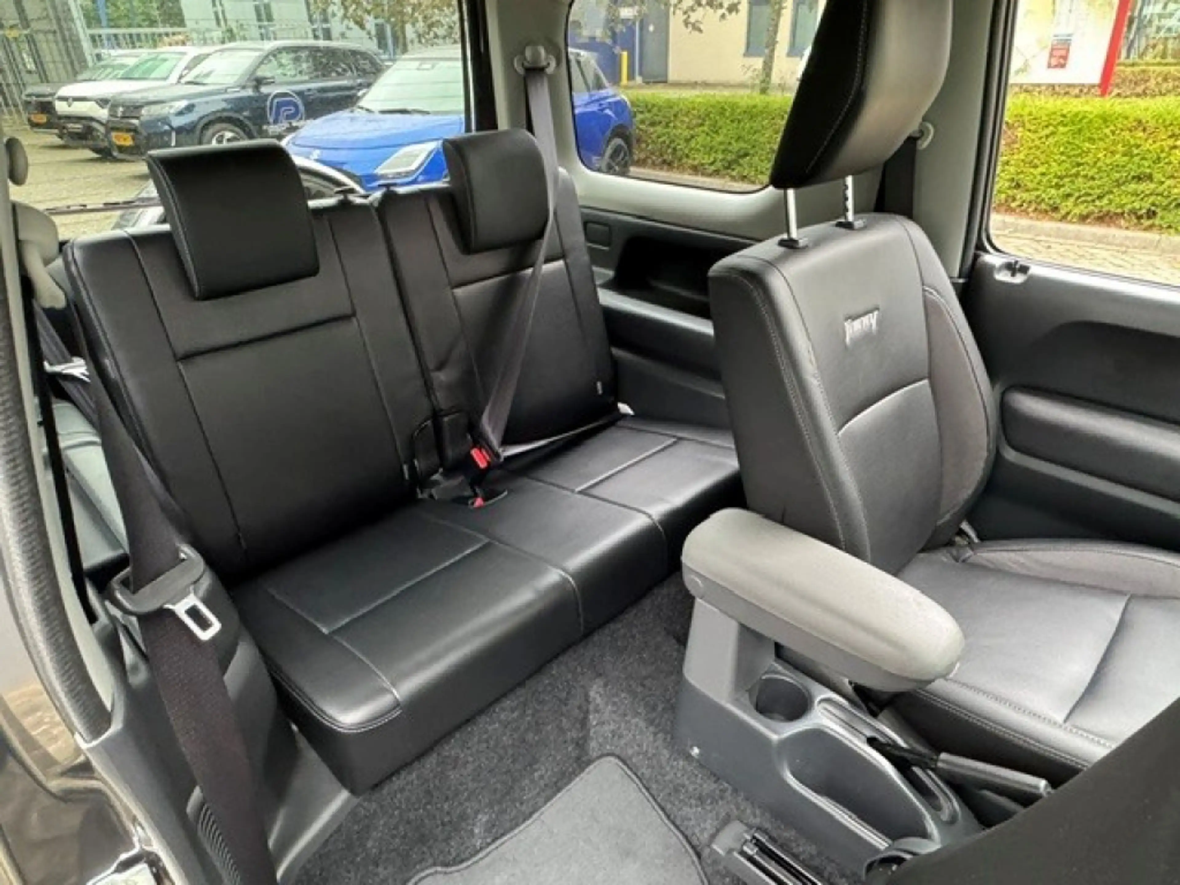 Suzuki Jimny 1.3 Exclusive Metal Top 4x4 Airco/Leder/Trekhaak — photo 21