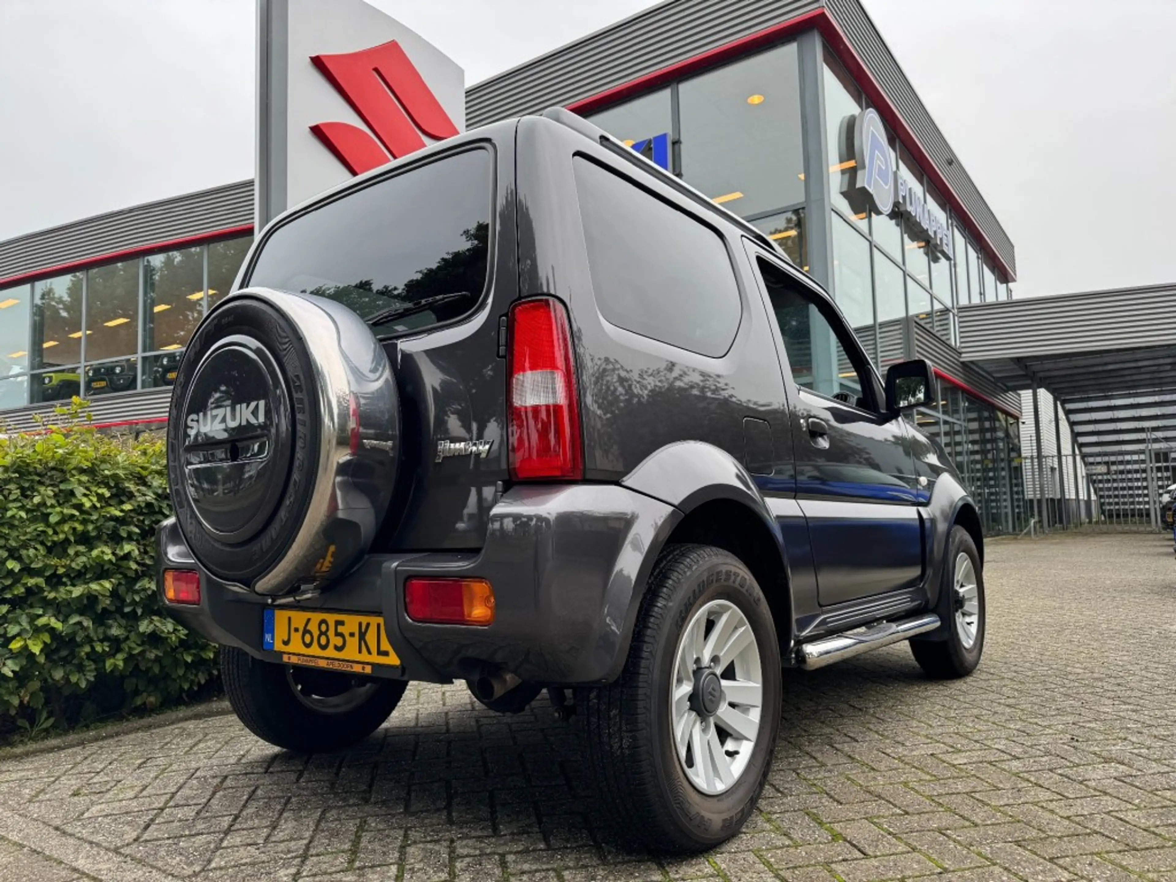 Suzuki Jimny 1.3 Exclusive Metal Top 4x4 Airco/Leder/Trekhaak — photo 8