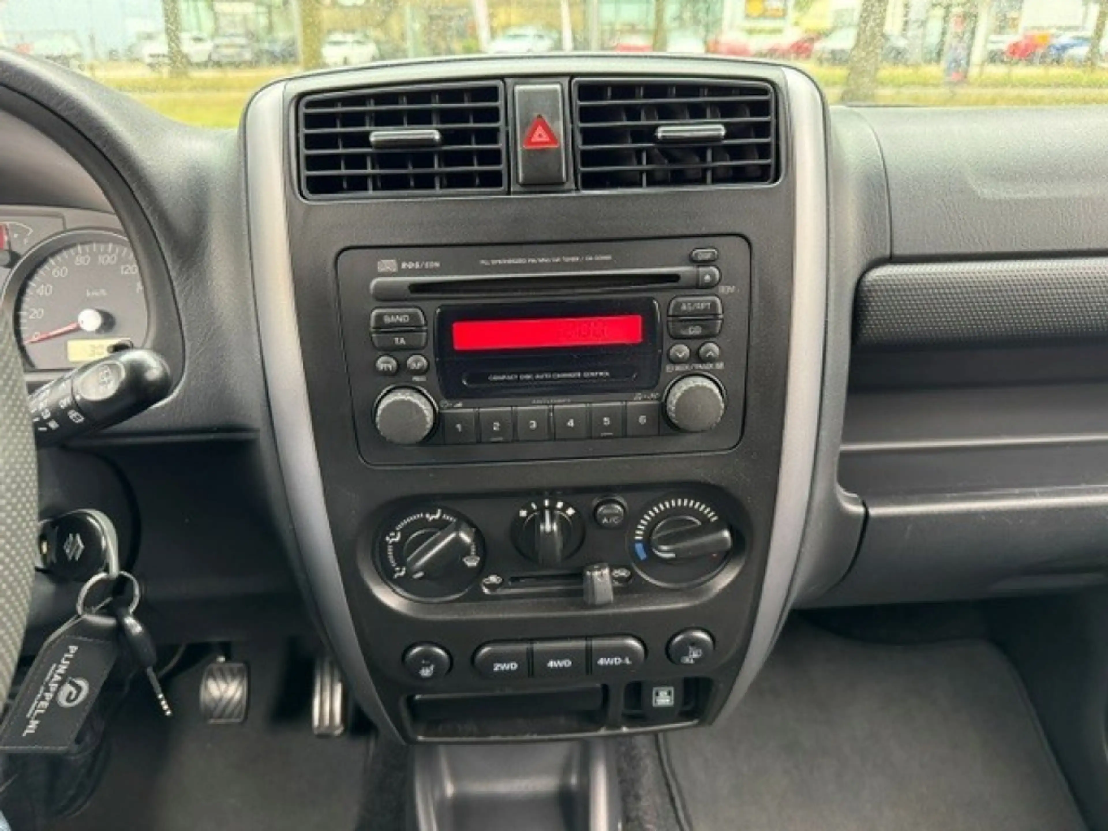 Suzuki Jimny 1.3 Exclusive Metal Top 4x4 Airco/Leder/Trekhaak — photo 20