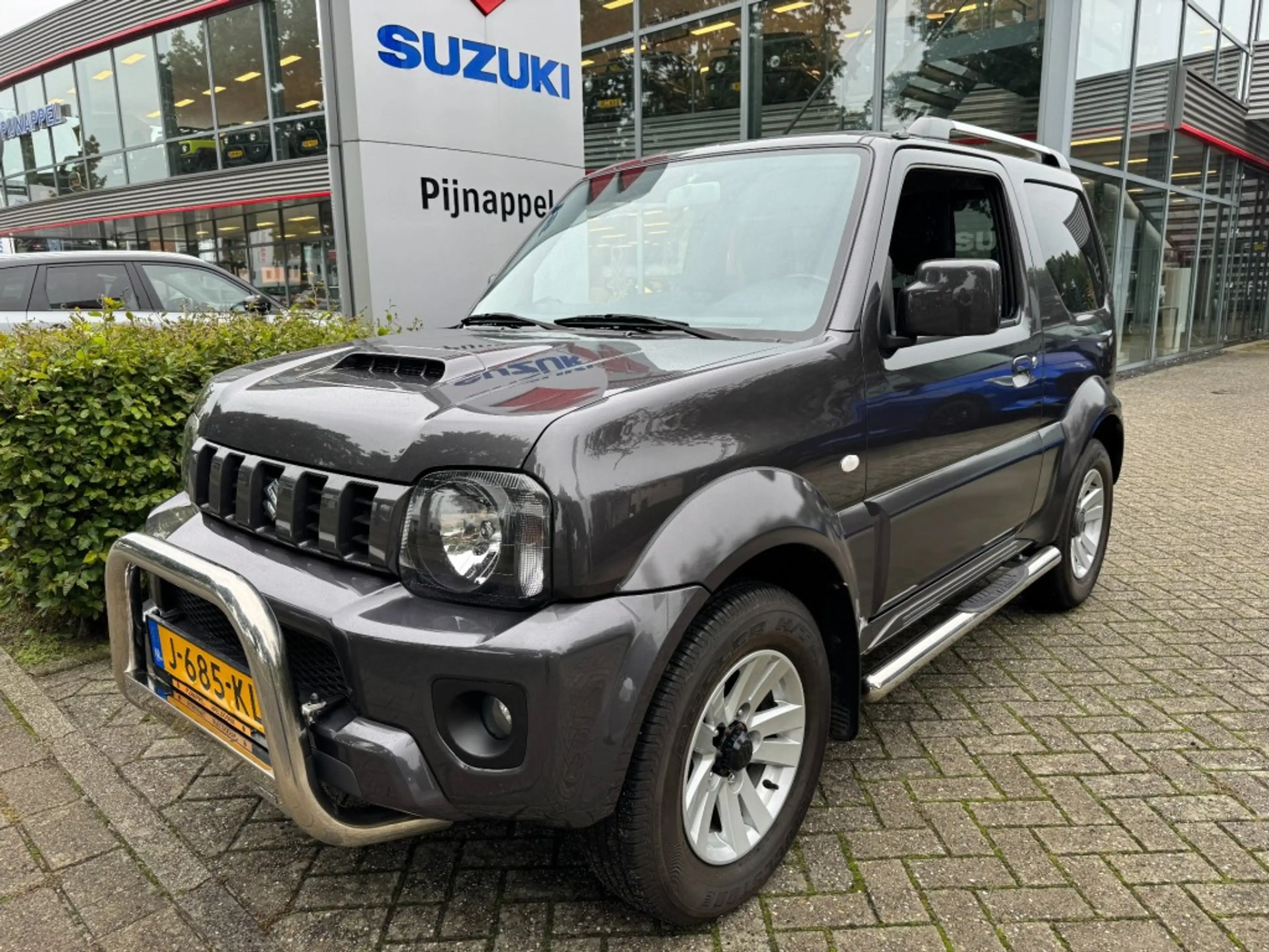 Suzuki Jimny 1.3 Exclusive Metal Top 4x4 Airco/Leder/Trekhaak — photo 5