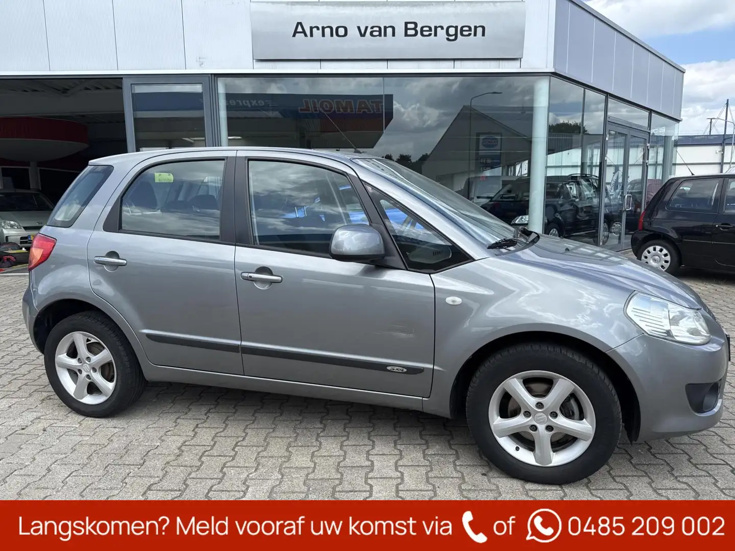 Suzuki SX4 1.6 Exclusive, climatronic, lm-velgen, trekhaak. Grijs - 1