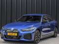 BMW i4 eDrive35 70 kWh | M-SEATS | SHADOW LINE | CAMERA | Blauw - thumbnail 8
