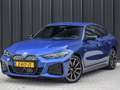 BMW i4 eDrive35 70 kWh | M-SEATS | SHADOW LINE | CAMERA | Blauw - thumbnail 2