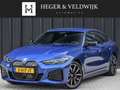 BMW i4 eDrive35 70 kWh | M-SEATS | SHADOW LINE | CAMERA | Blauw - thumbnail 1