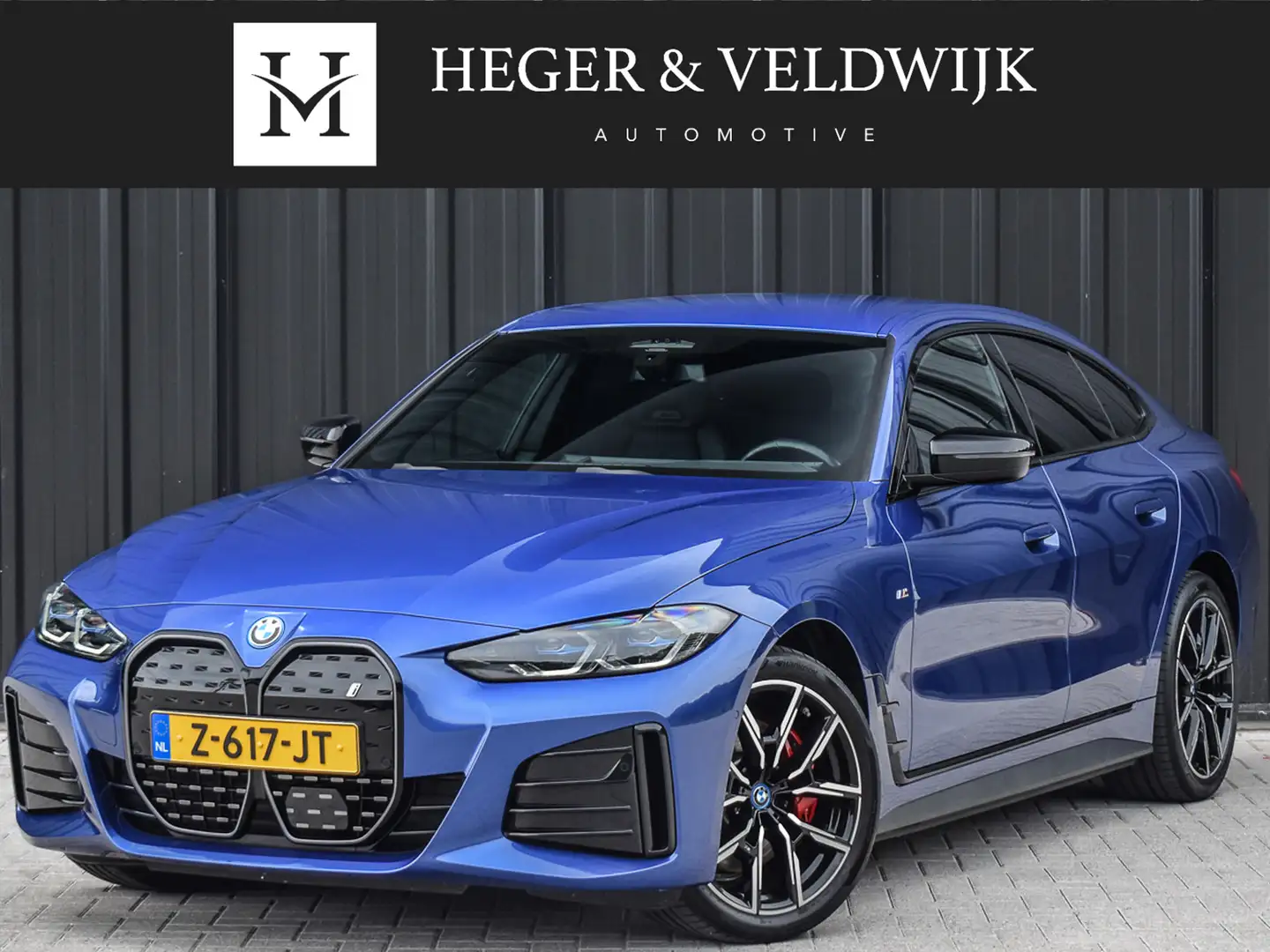 BMW i4 eDrive35 70 kWh | M-SEATS | SHADOW LINE | CAMERA | Blauw - 1