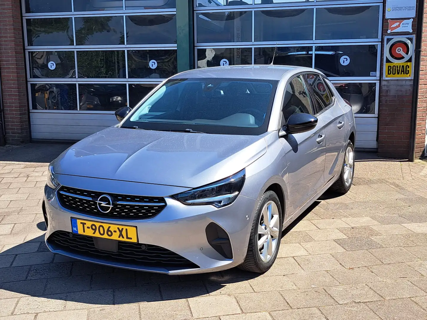Opel Corsa 1.2 Elegance Grijs - 1