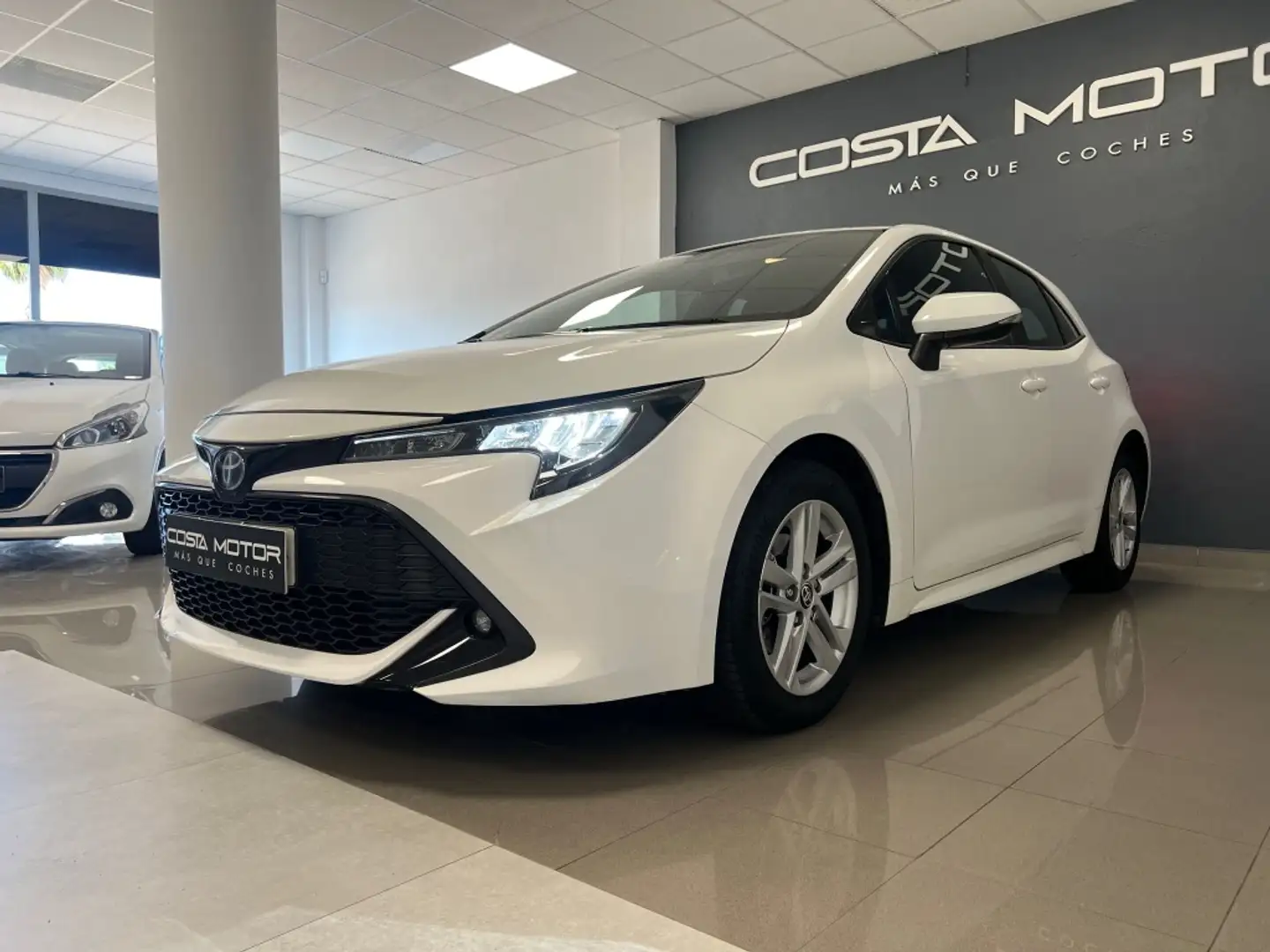 Toyota Corolla 125H Active Tech Blanc - 1