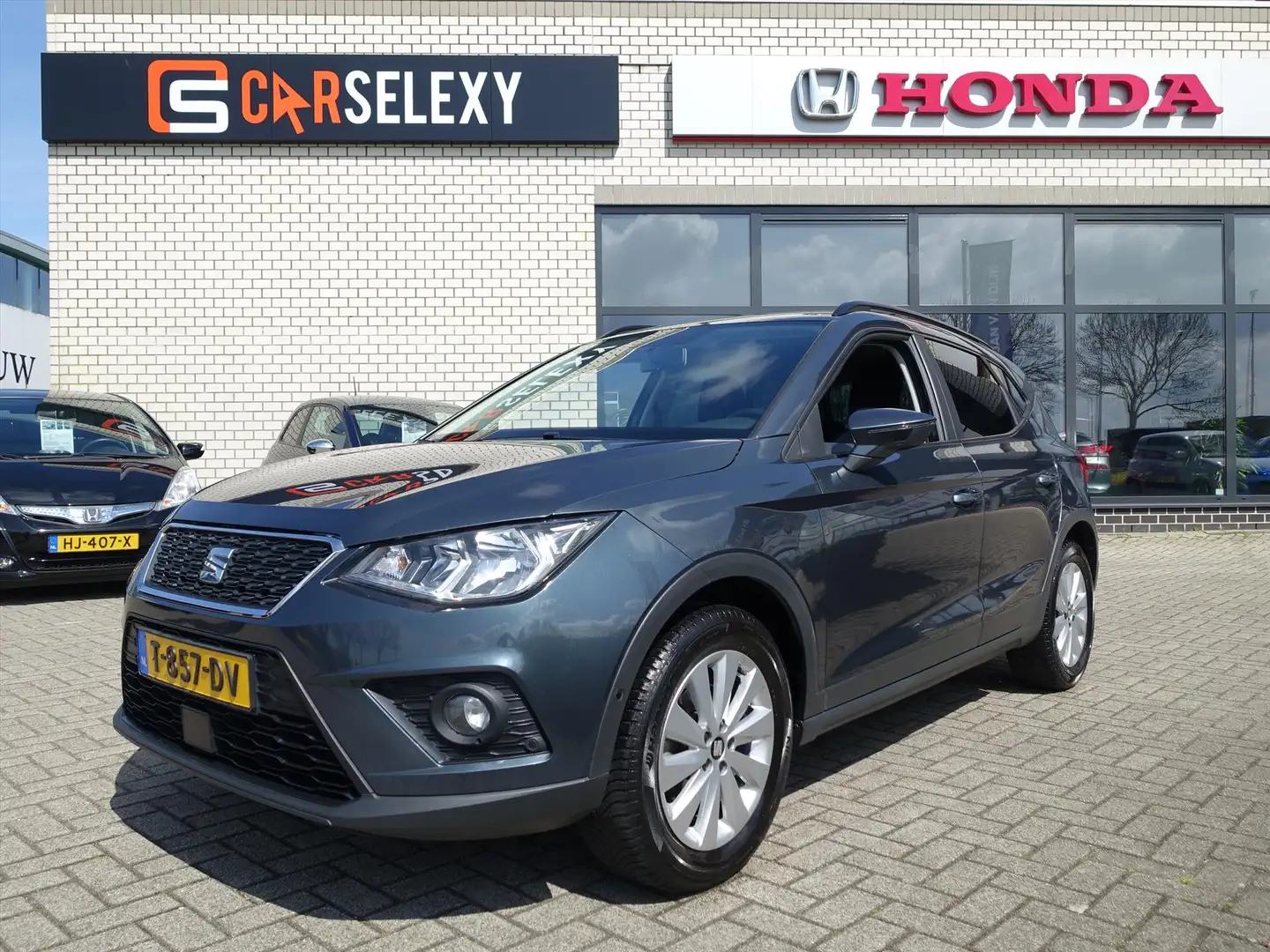 SEAT Arona 1.0 TSI 95pk Style Privacy Glas Middenarmsteun Gris - 1