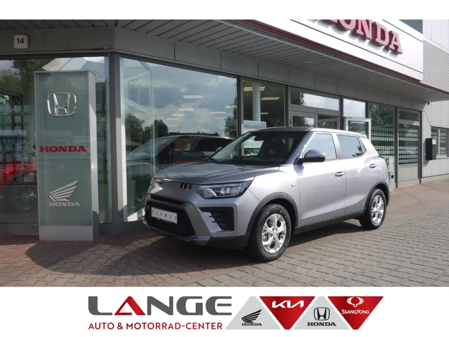 KGM Tivoli 1.5 T-GDi Nomad Navi SHZ Temp Tel.-Vorb. PDC Regen Silber - 1