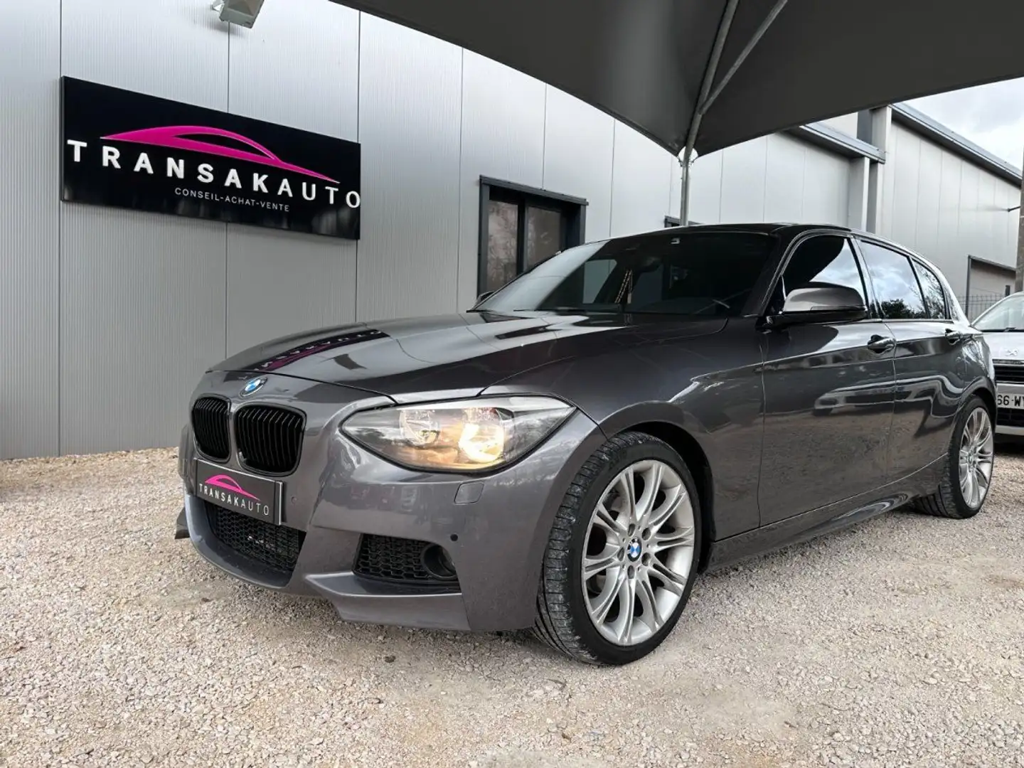BMW 118 SERIE F20 118d 143 ch Sport / Pack M / Toit Ouvrant / Sièges Chauffants Gris - 1