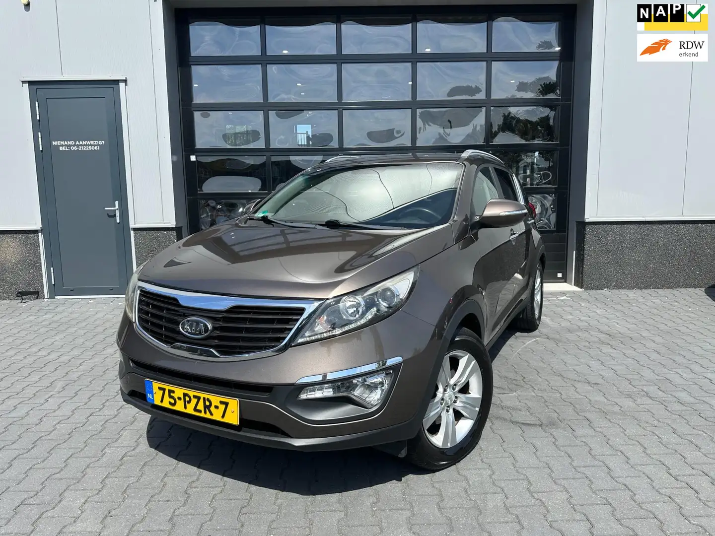Kia Sportage 2.0 X-ecutive Plus automaat trekhaak Marrone - 1
