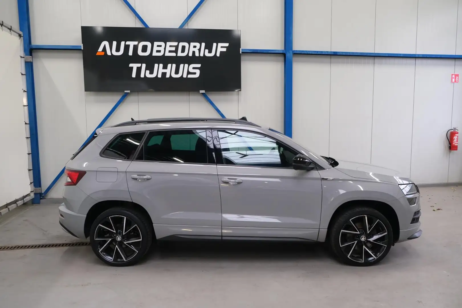 Skoda Karoq 1.5 TSI ACT Sportline Business - N.A.P. Airco, Cru Grijs - 2