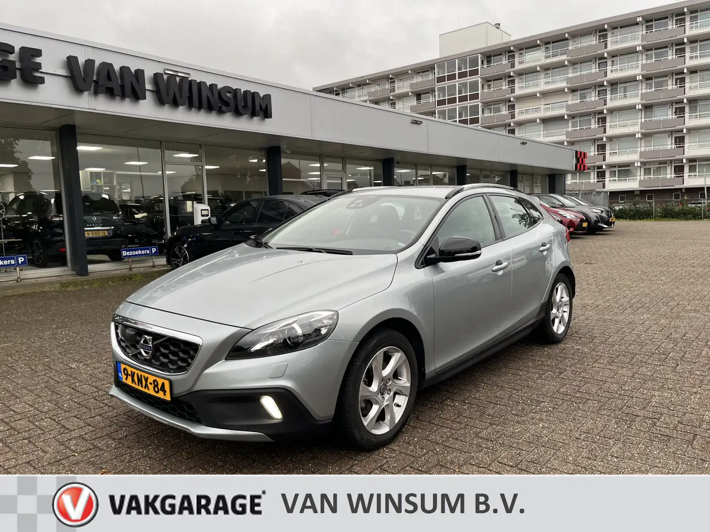 Volvo V40 Cross Country 1.6 T4 Summum automaat Leer Acamera Bi-xenon Navi Grijs - 1