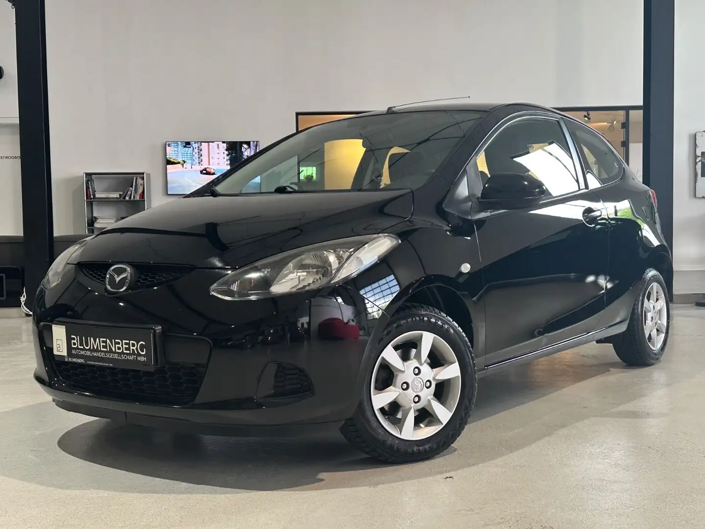 Mazda 2 Lim. 1.3 Impuls Sport *Servo,CD,Radio* Noir - 1