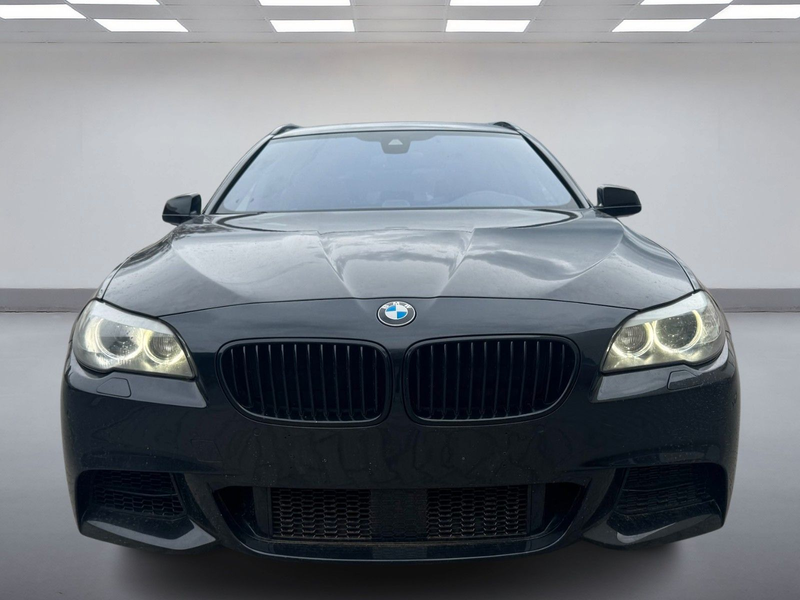 BMW 550 d xDrive Touring — photo 8
