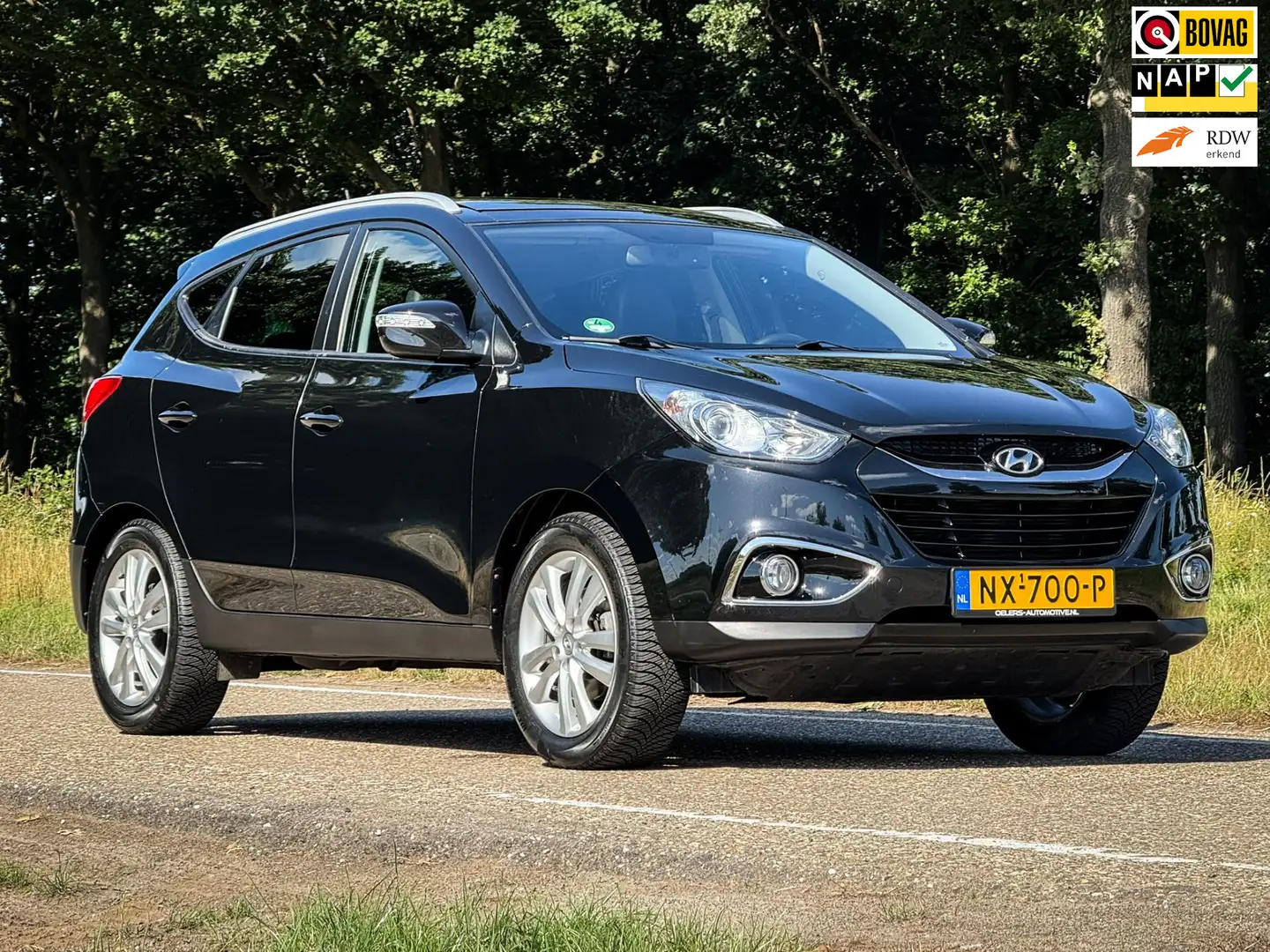 Hyundai iX35 2.0i i-Catcher | Clima | Cruise | Panorama dak | T Zwart - 1