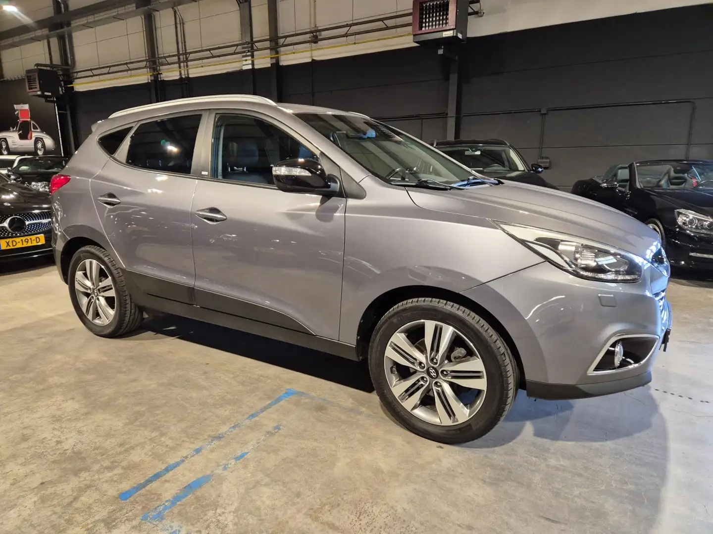 Hyundai iX35 2.0i 4WD i-Catcher - Automaat - Clima - Cruise - S Grijs - 2