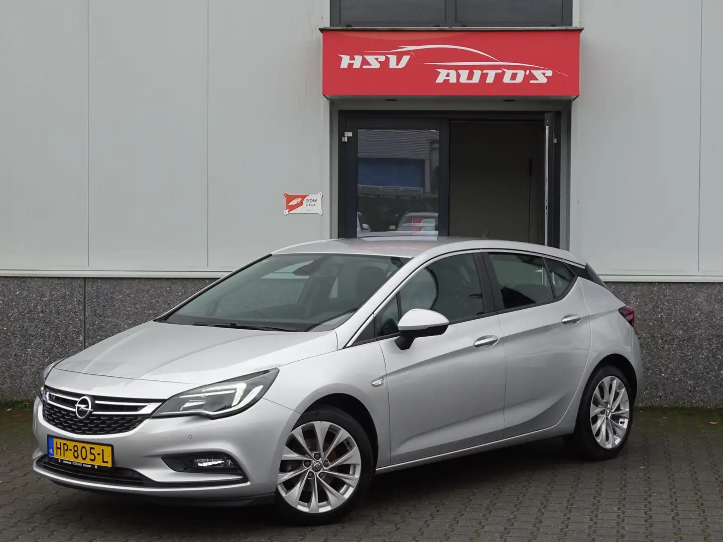 Opel Astra 1.0 Business+ airco navigatie org NL 2015 Grijs - 1