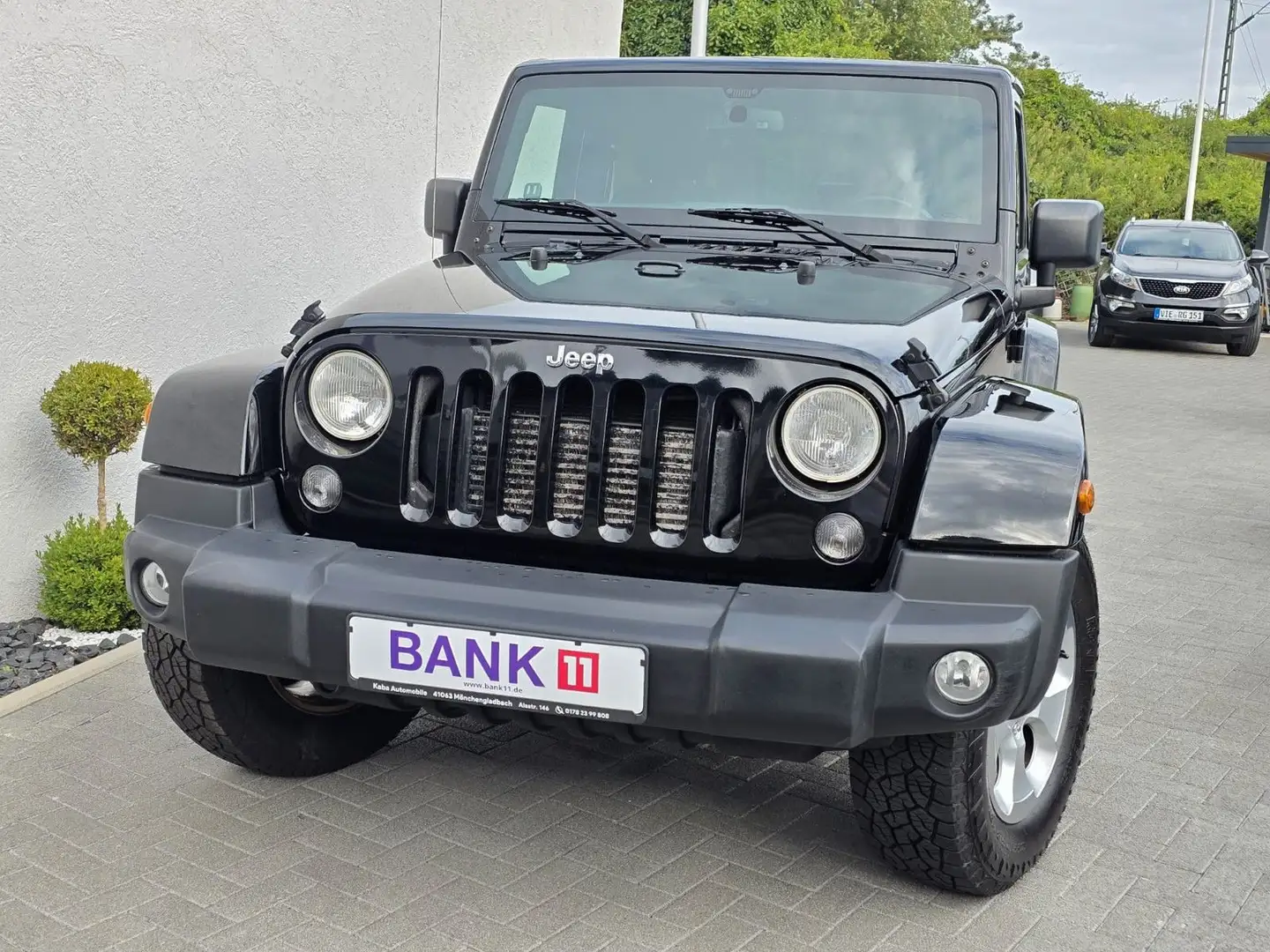 Jeep Wrangler / Wrangler Unlimited Sahara/Navi- Schwarz - 1