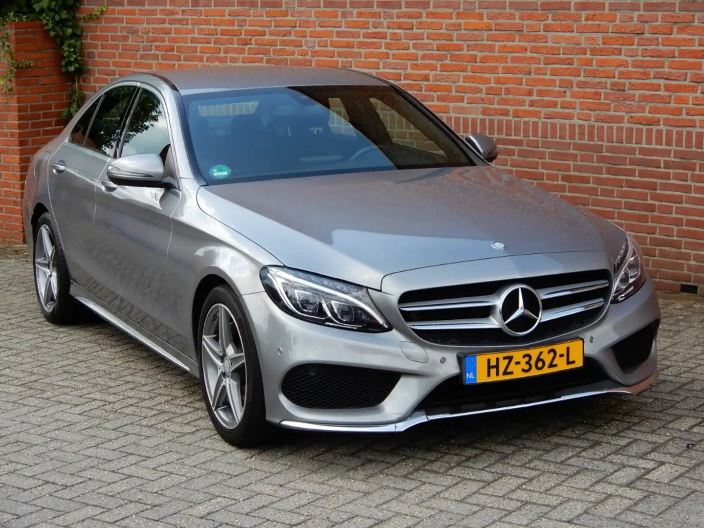Mercedes-Benz C 180 180 AMG LINE leer 64.000km Grijs - 1