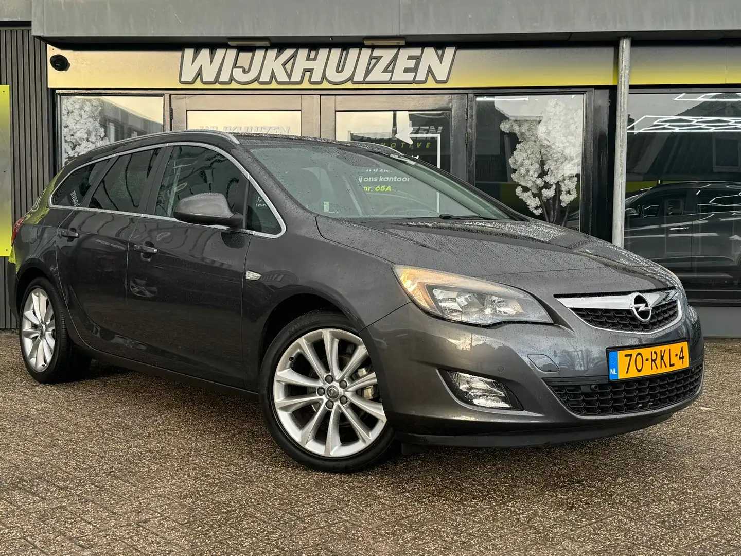 Opel Astra Sports Tourer 1.4 Turbo Sport met Airco !!! Naviga Grau - 2