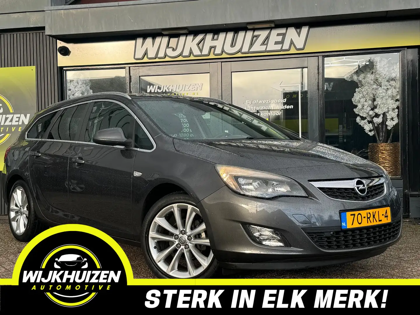 Opel Astra Sports Tourer 1.4 Turbo Sport met Airco !!! Naviga Grau - 1