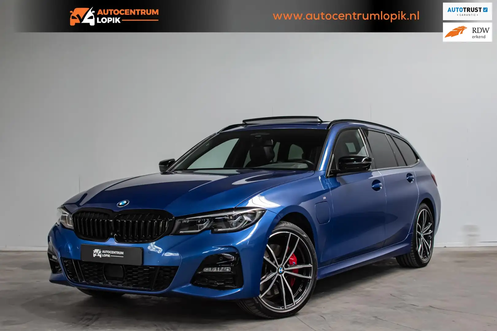 BMW 330 3-serie Touring 330e xDrive High Executive M Sport Blau - 1