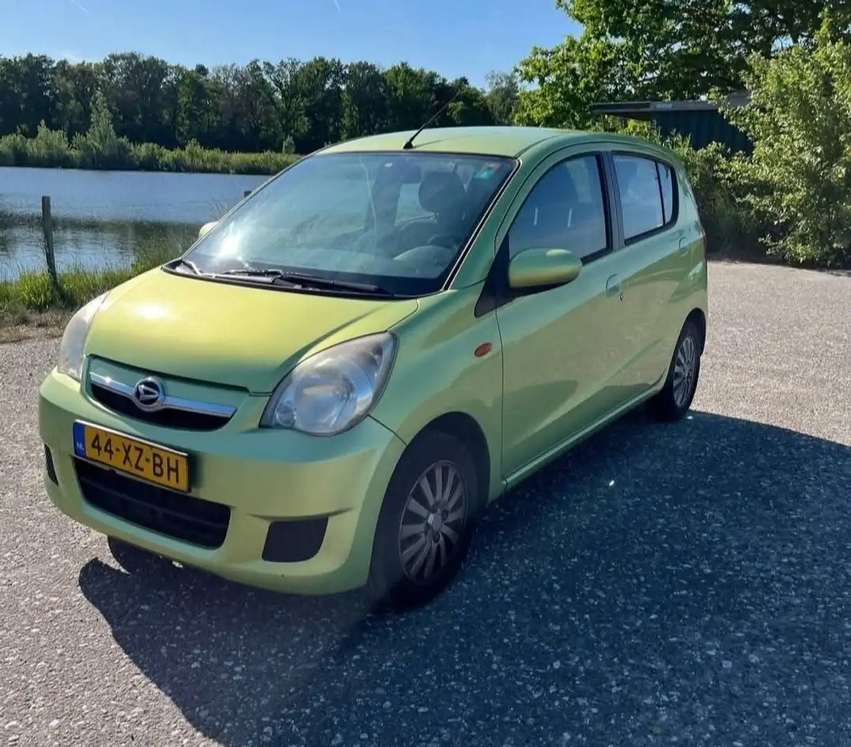 Daihatsu Cuore 1.0 Premium Groen - 1