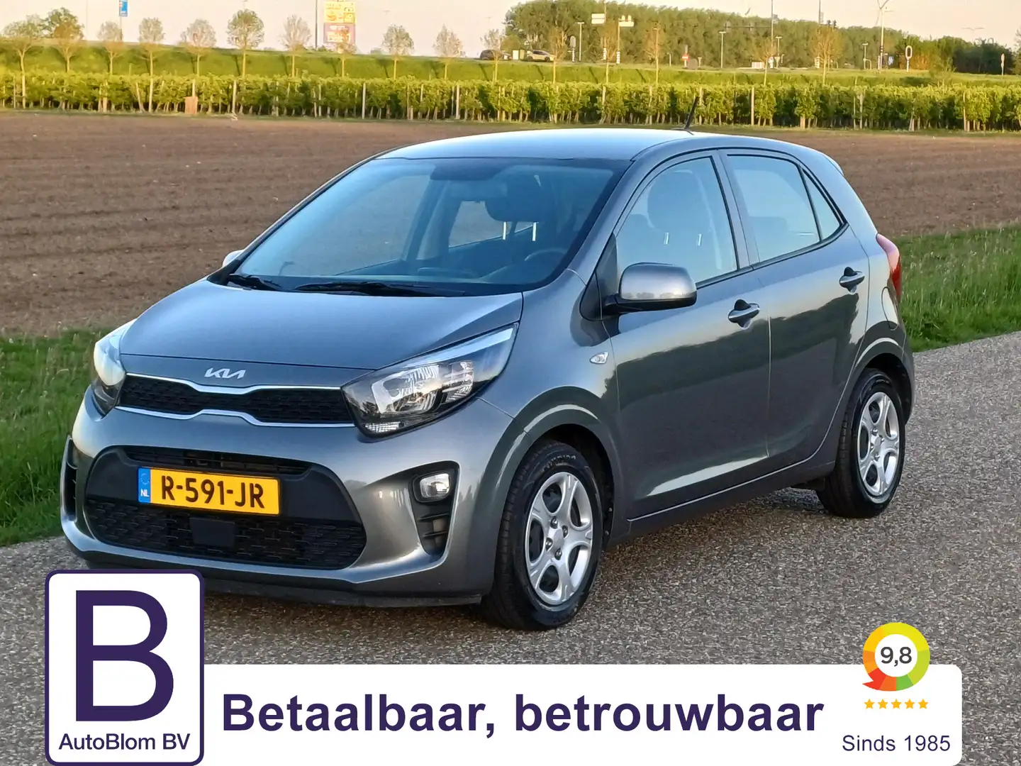 Kia Picanto 1.0 DPi ComfortLine /Airco/Cruise/USB/Bluetooth/Mi Gris - 1