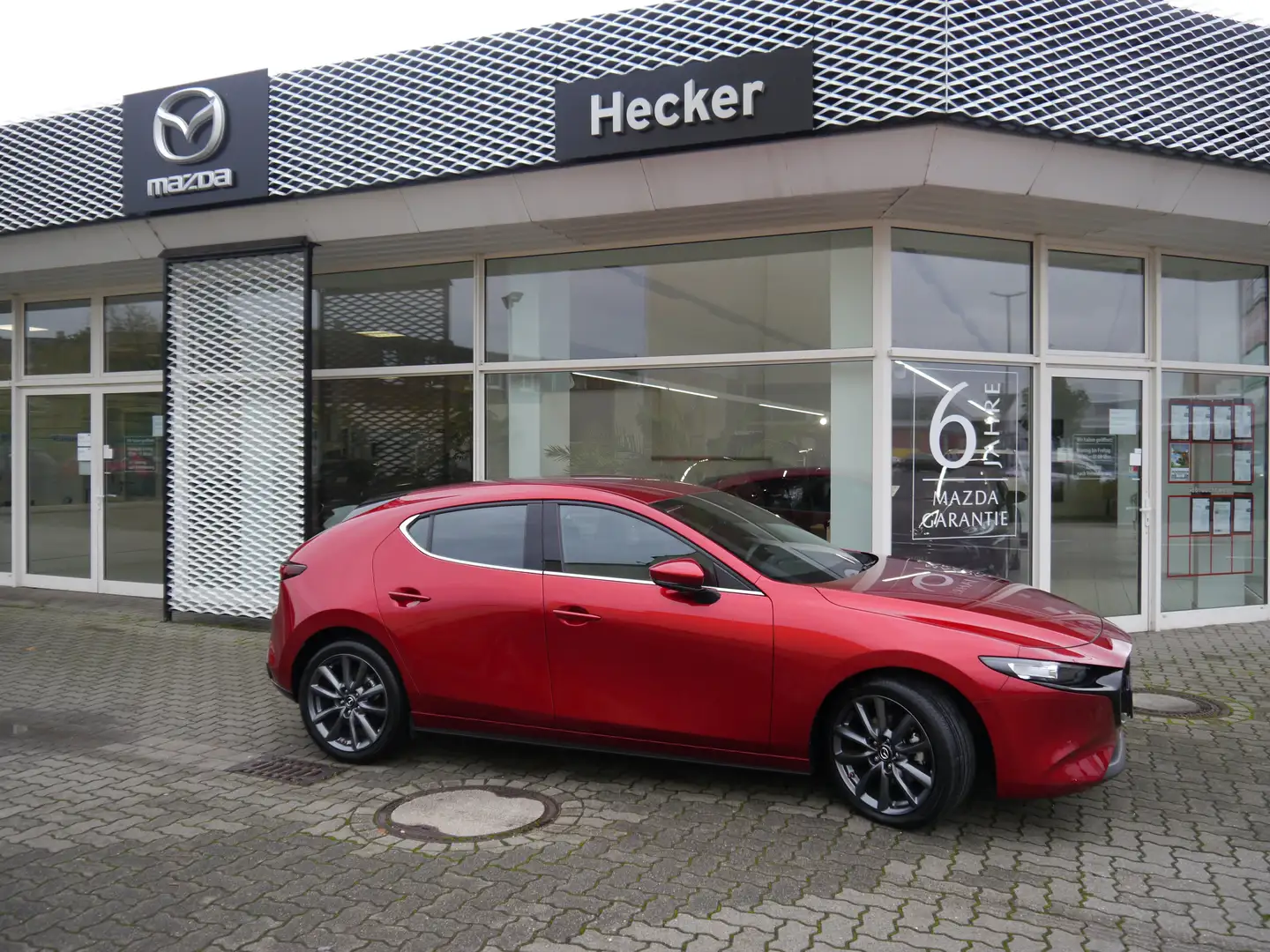 Mazda 3 e-SKYACTIV-G 140 M HYBR HOMURA mit 5000€ Rabatt Rot - 1