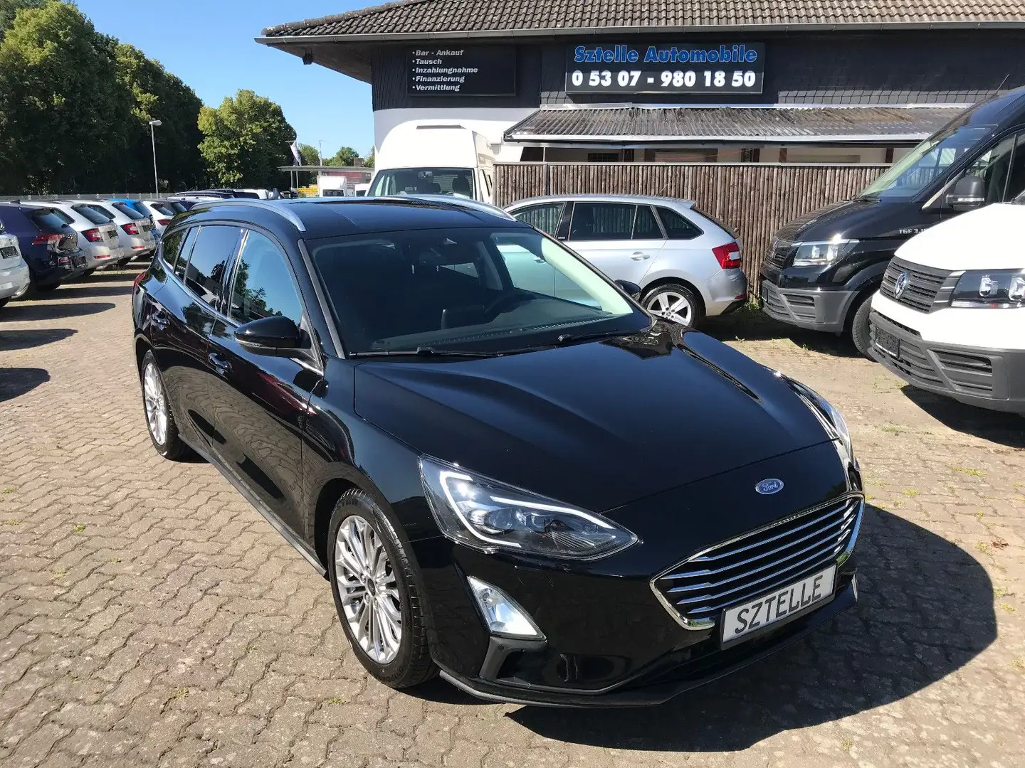 Ford Focus Turnier Titanium*NAVI*SHZ*PDC*TEMPOMAT* Schwarz - 1