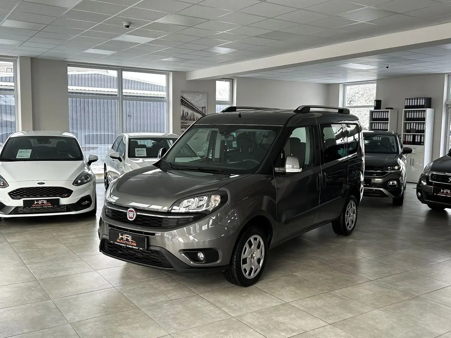Fiat Doblo Easy1.4 Family paketit 7-Sitzer Klima Grau - 1