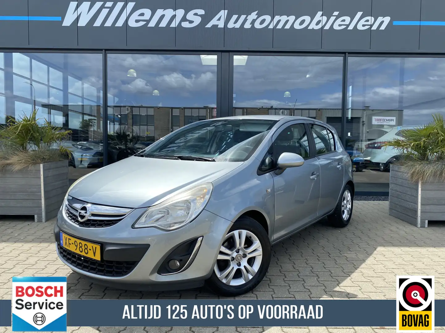 Opel Corsa 1.2-16V Anniversary Edition Airco, Cruise Control Grijs - 1