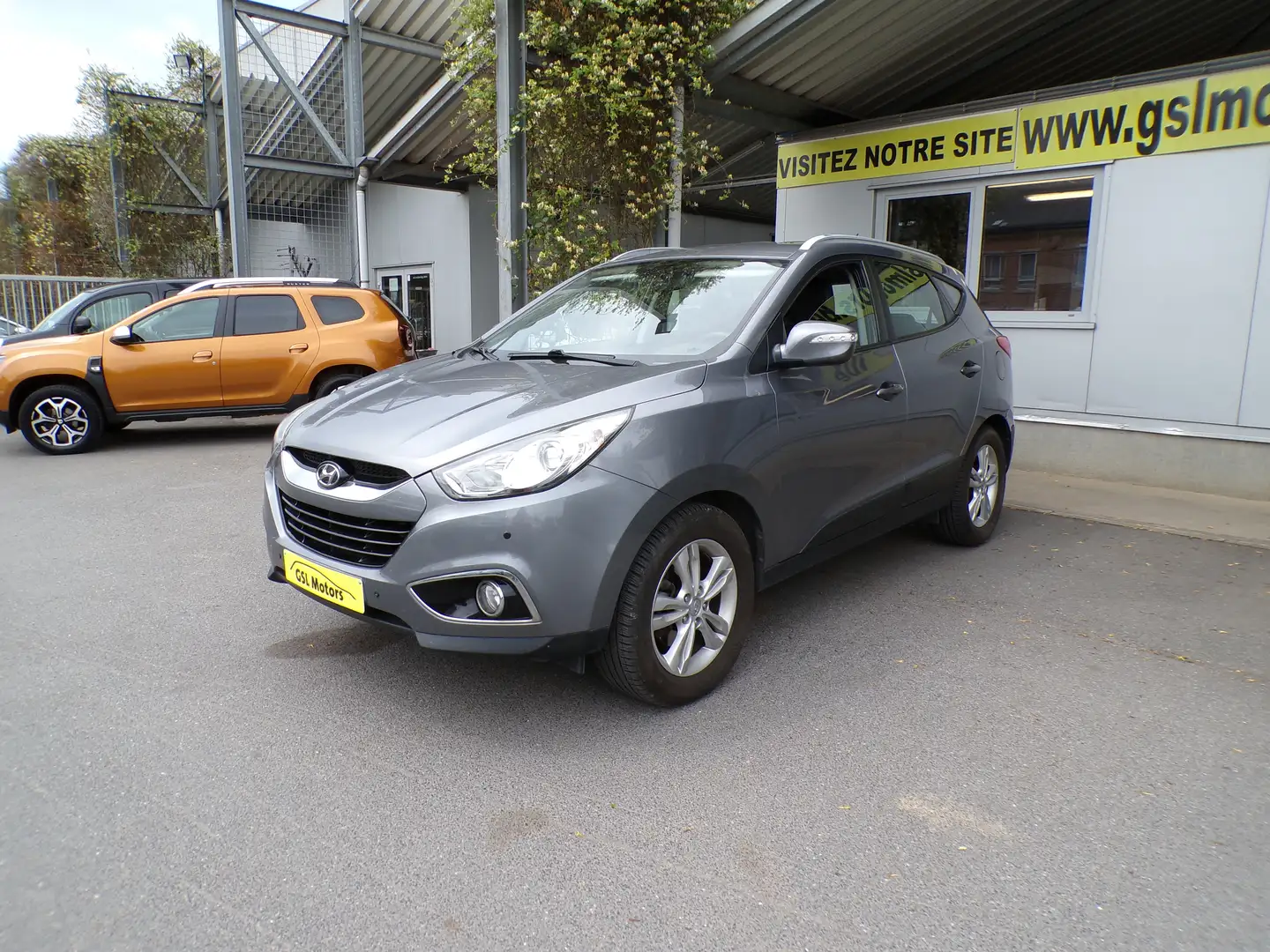 Hyundai iX35 2.0CRDi 136cv 2WD Gris 08/12 Airco GPS Capteurs CD Grijs - 1