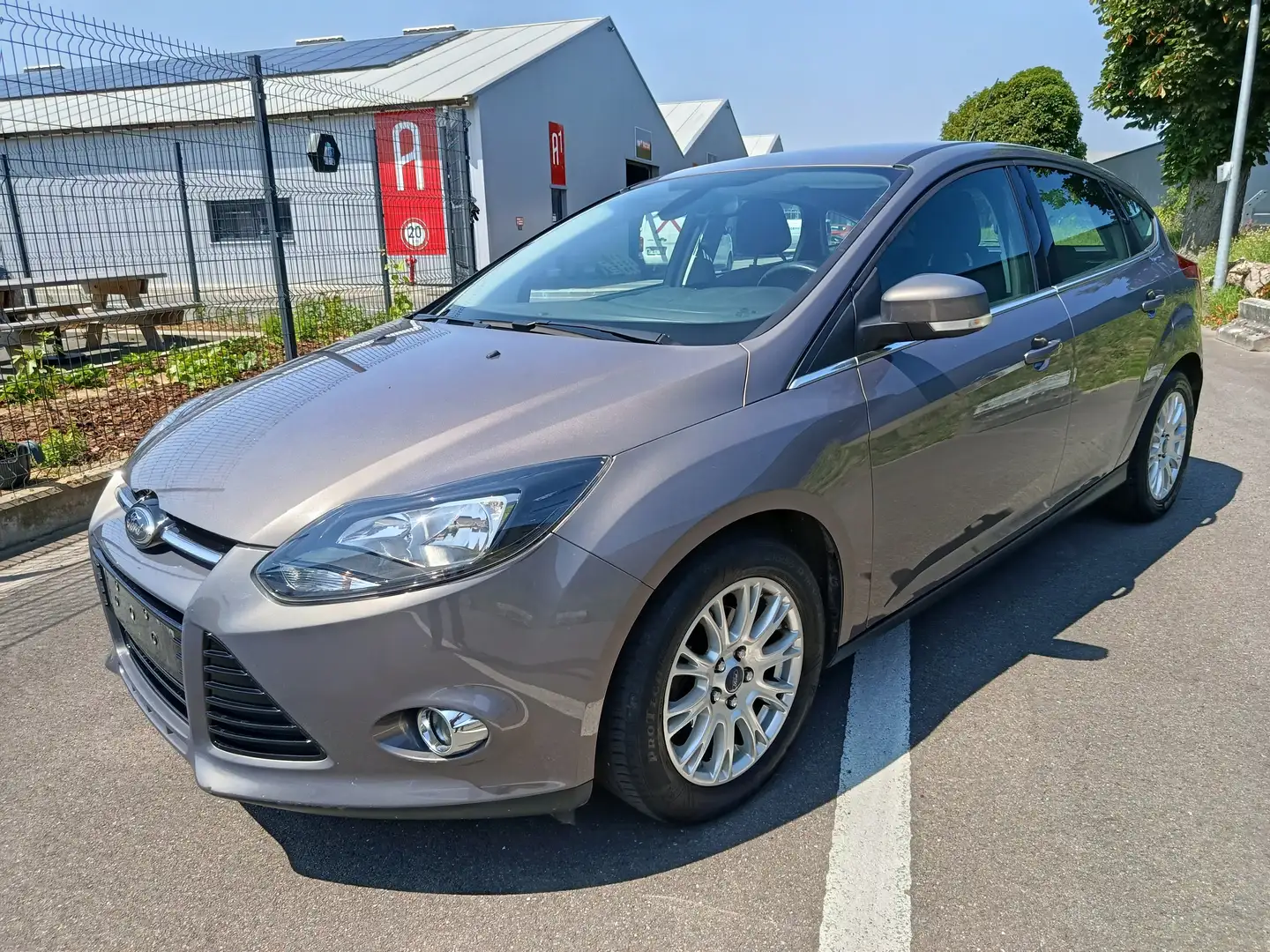 Ford Focus 1.0 EcoBoost ECOnetic Tech. Titanium Bruin - 1