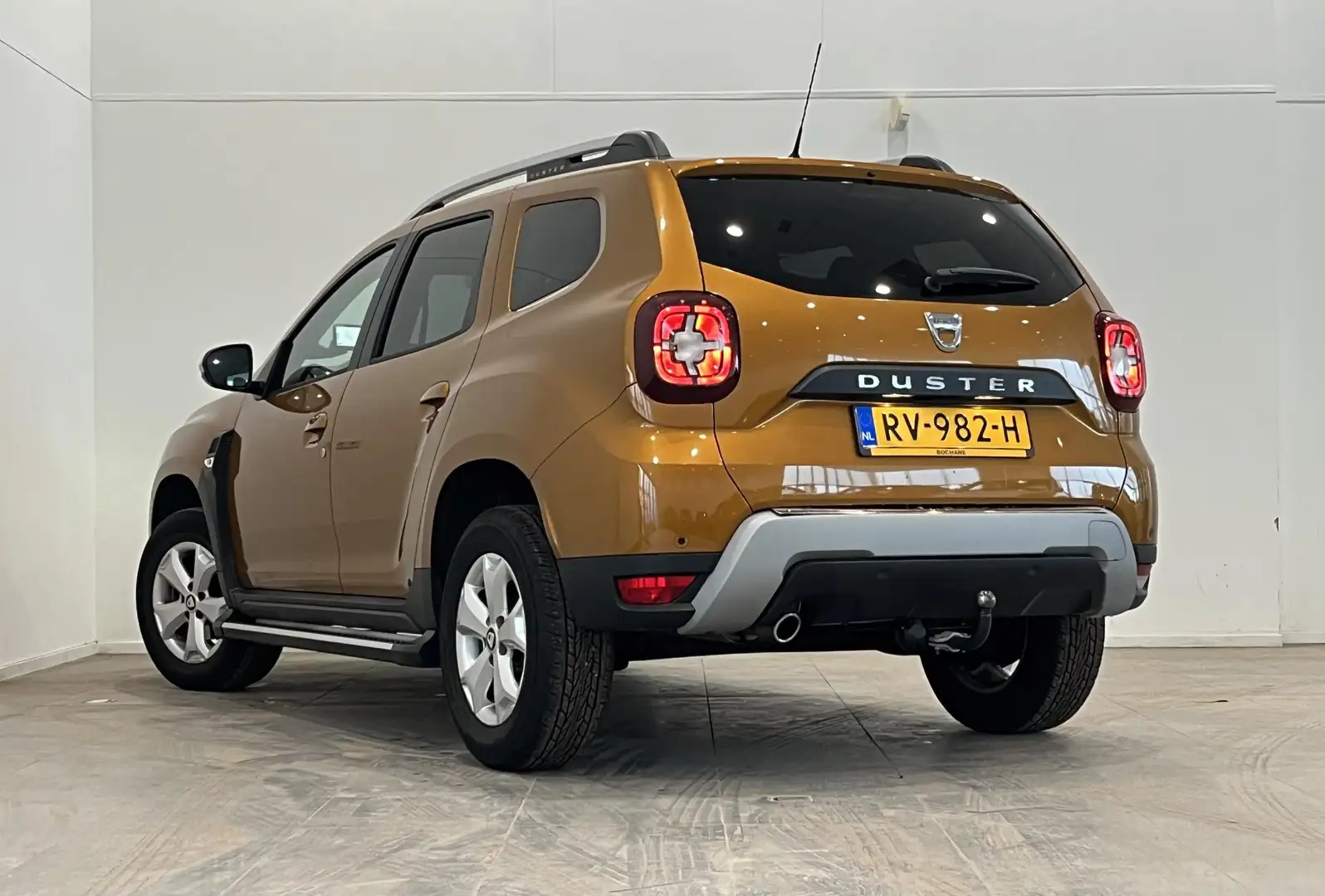 Dacia Duster 1.2 TCe 125 Comfort | Sidebars | Trekhaak | Airco Oranje - 2