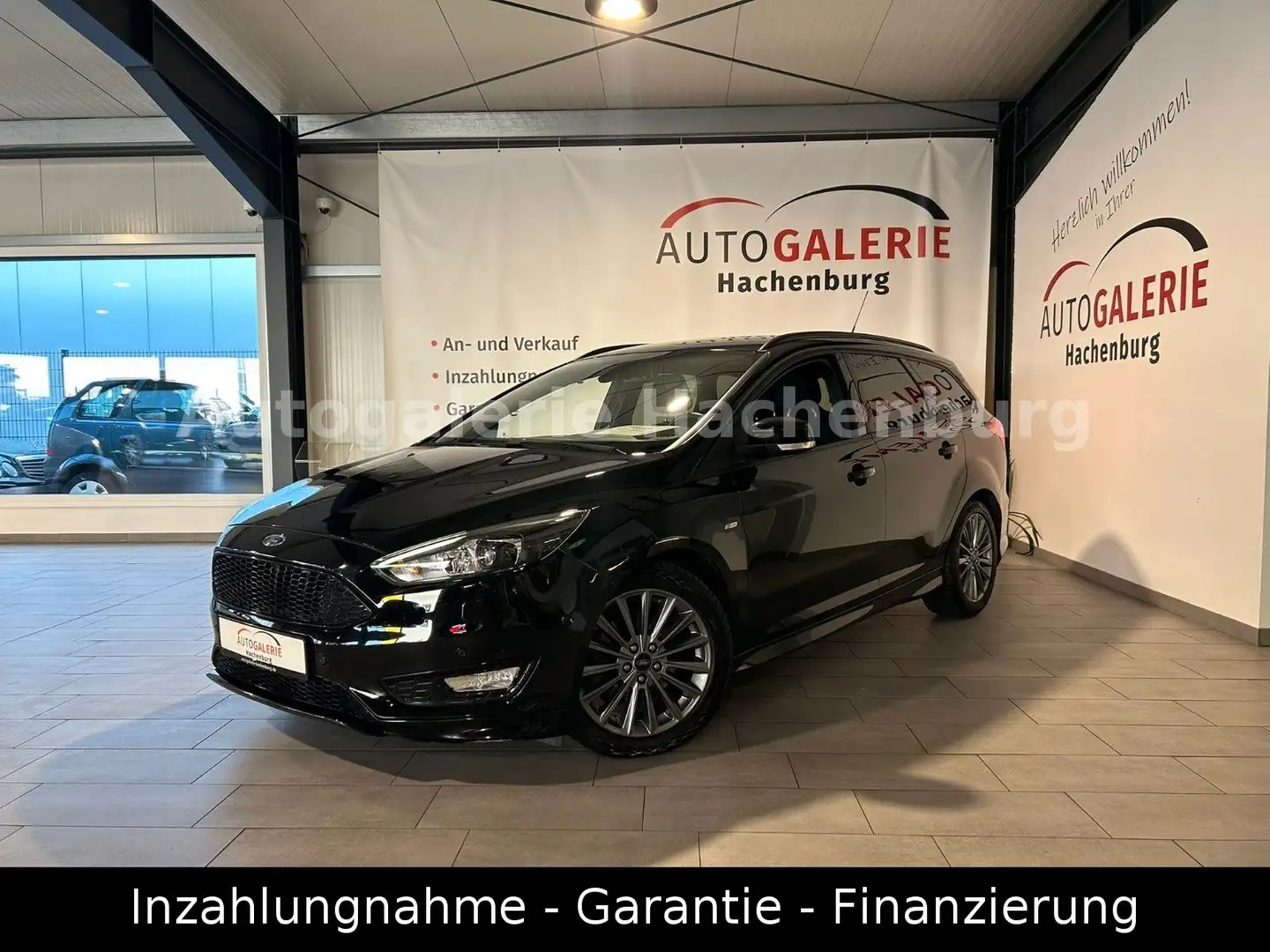 Ford Focus Turnier ST-Line Aut./Xenon/Navi/GARANT/E6 Schwarz - 1