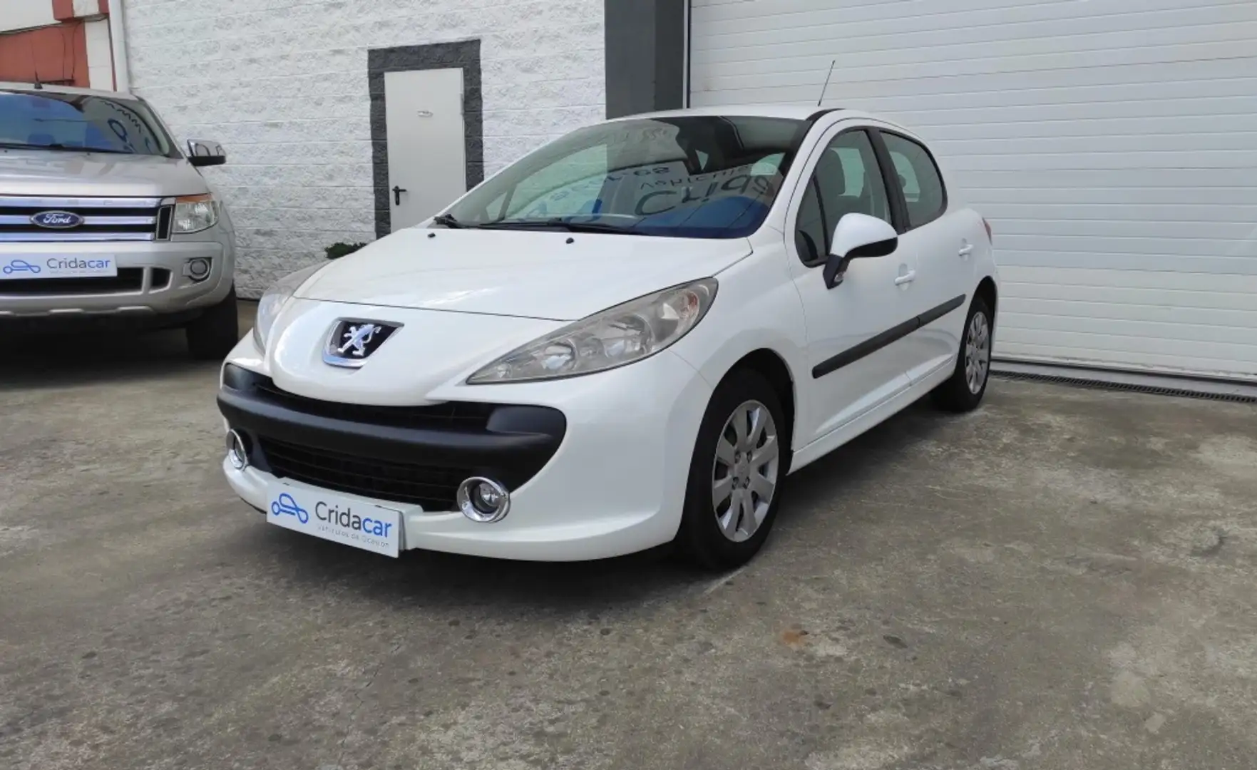 Peugeot 207 1.4HDI Confort Wit - 1
