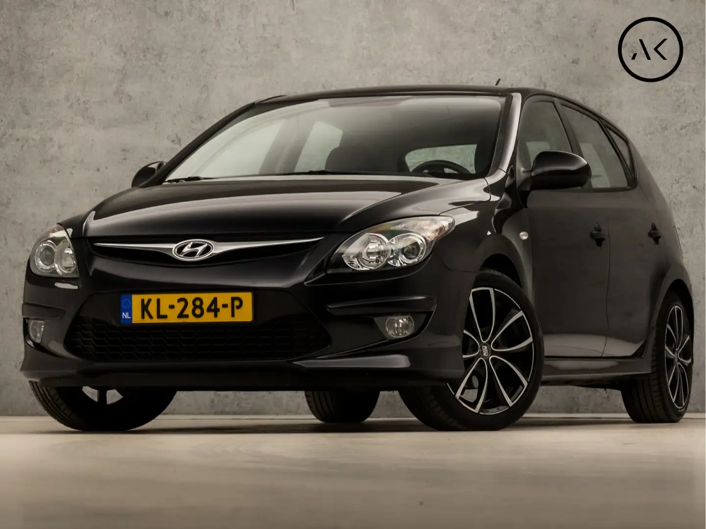 Hyundai i30 1.4i i-Drive Cool (AIRCO, LM VELGEN, ELEK PAKKET, Zwart - 1