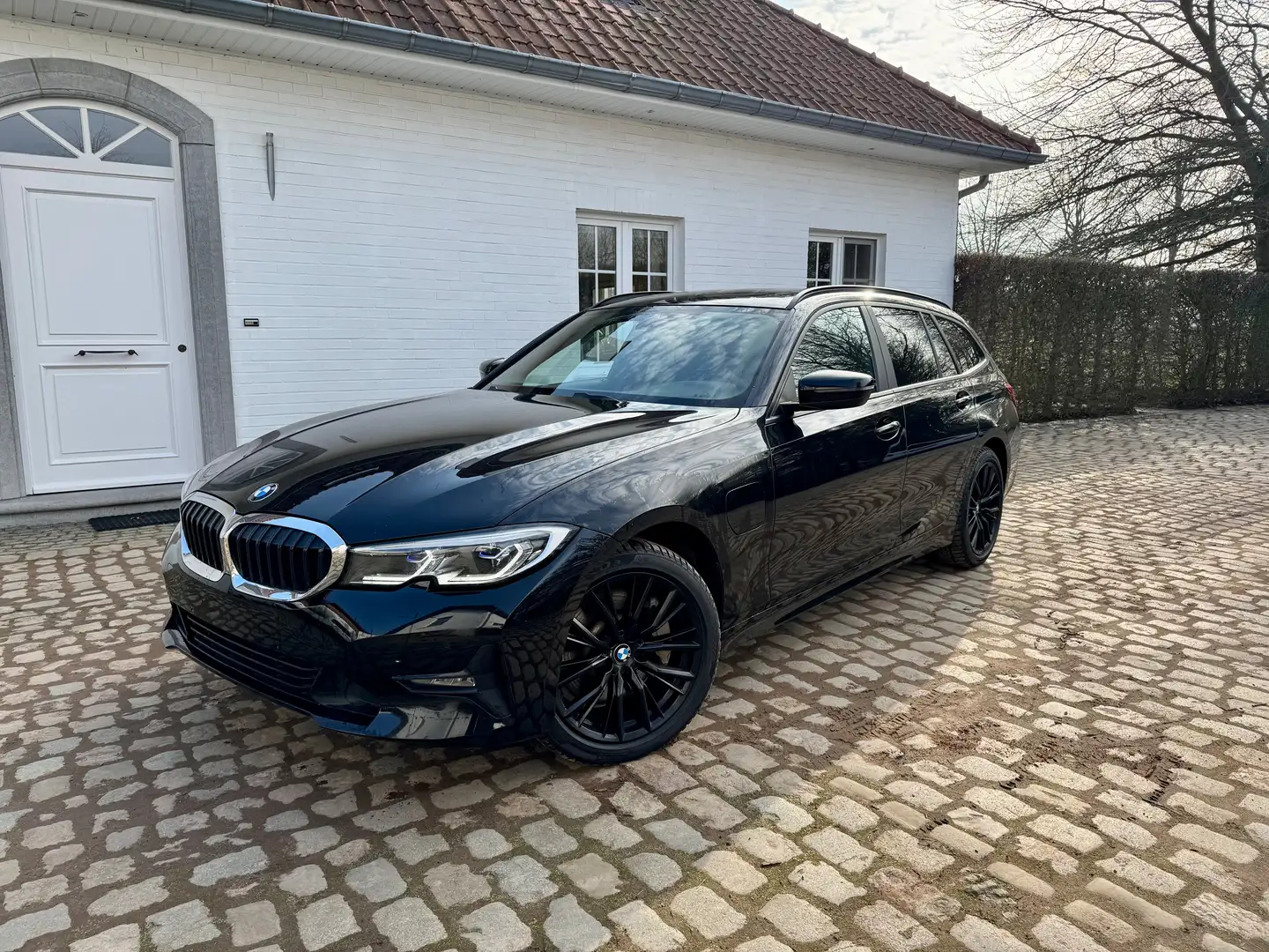 BMW 330 e Touring X-Drive PHEV Automaat - Nieuwstaat! Zwart - 1
