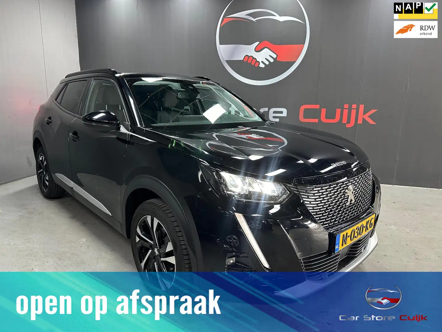 Peugeot 2008 1.2 PureTech Blue Lease Allure | +12m garantie | C Zwart - 1