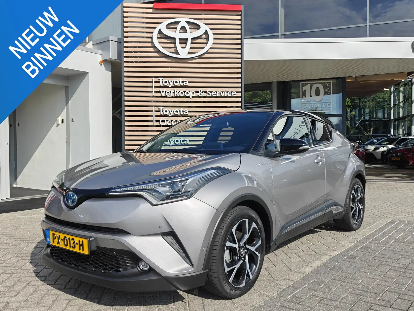 Toyota C-HR 1.8 HYBRID BI-TONE TREKHAAK NAVI STOEL/STUURVERW 1 Grijs - 1